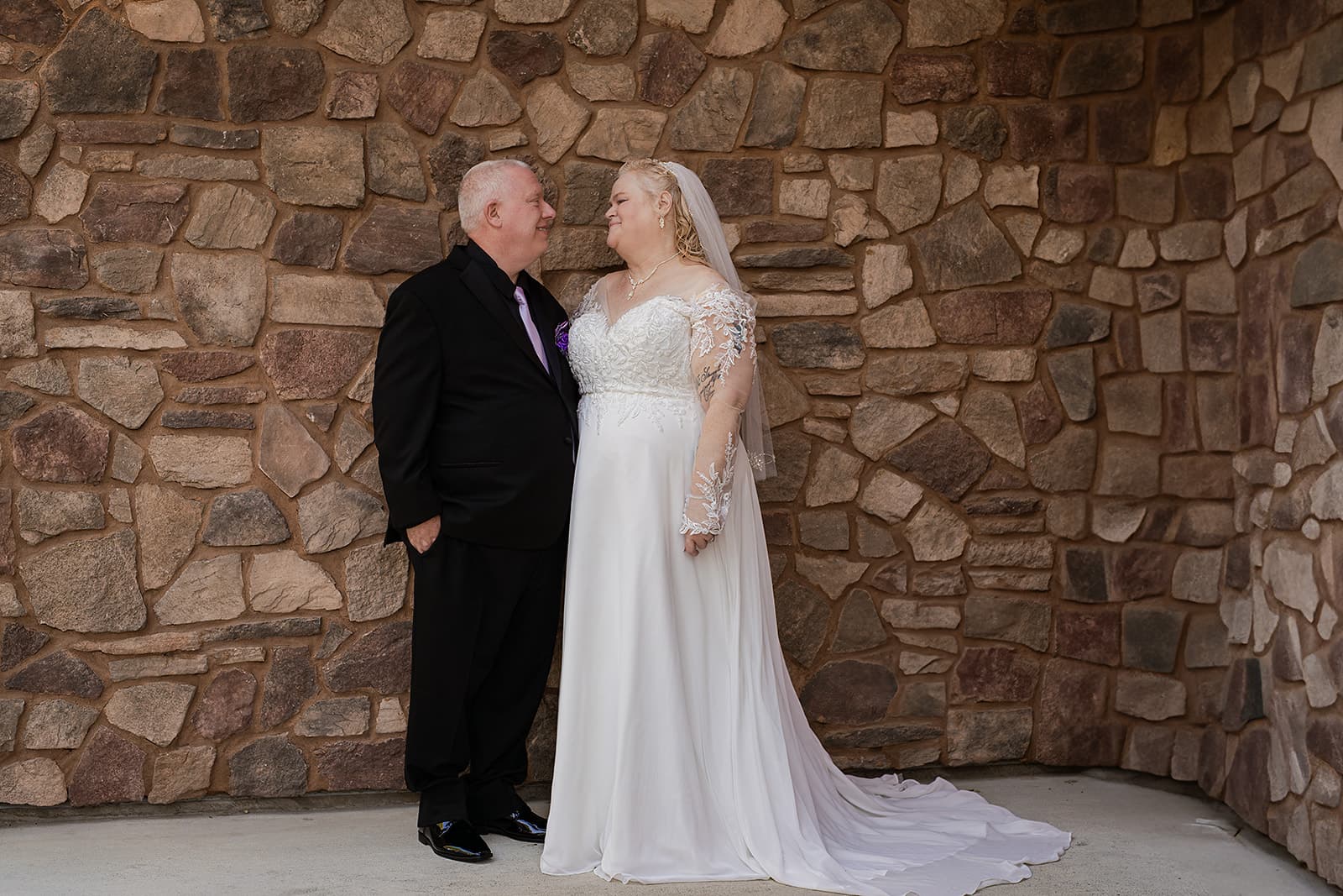 Family laughing outdoors in winter